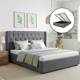 Gray upholstered bed with tufted headboard in a bedroom setting.
