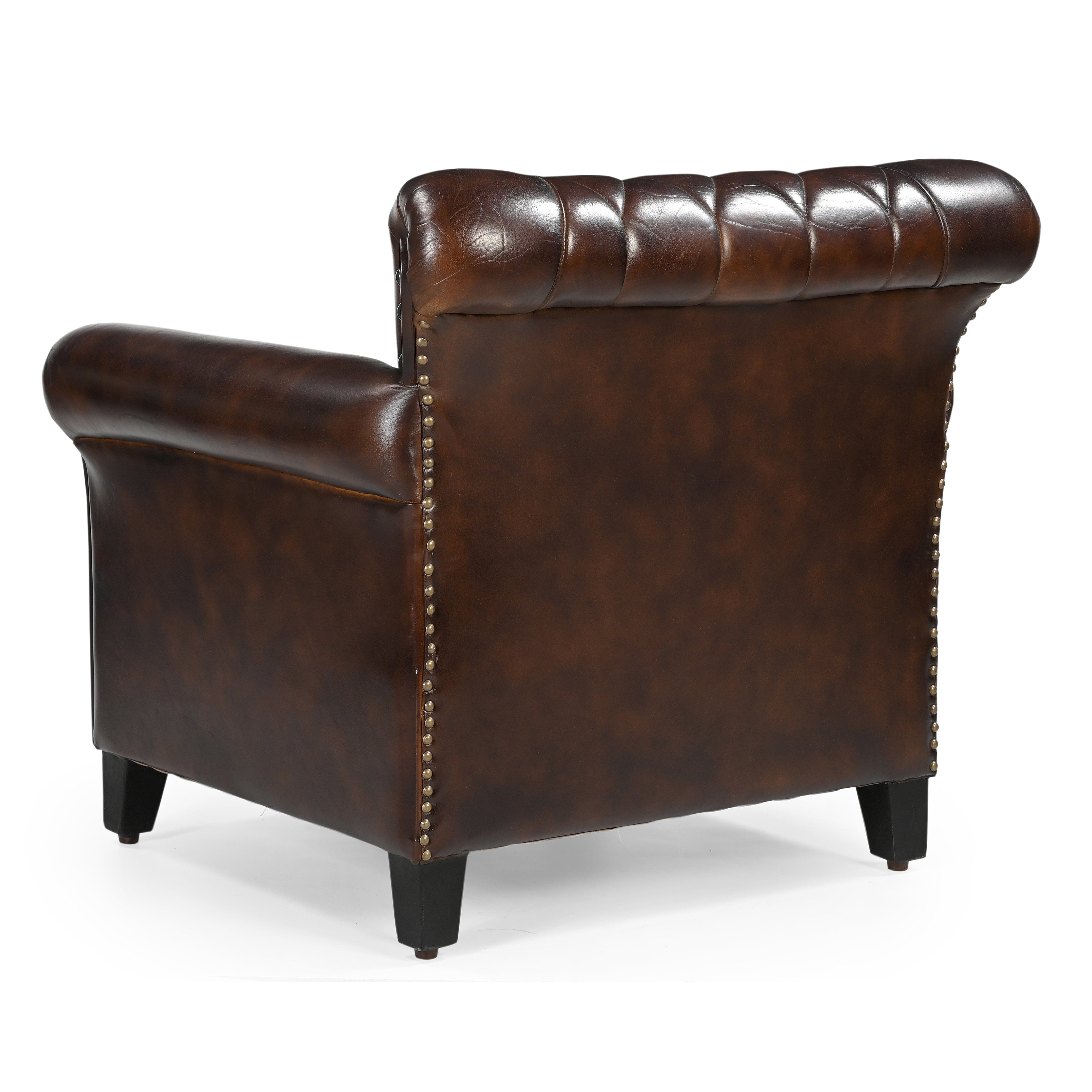 STUDDED LEATHER ARM CHAIR Chez Guru